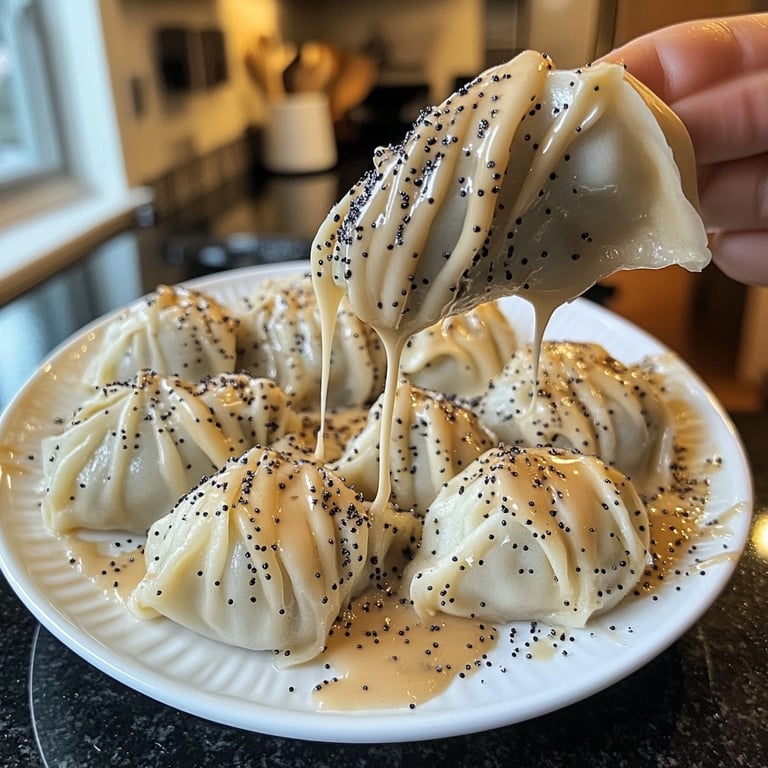 Steamed Dumplings with Vanilla Sauce and Poppy Seeds